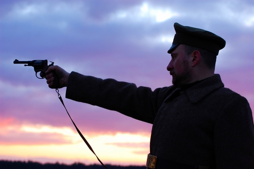 soldier pointing a gun